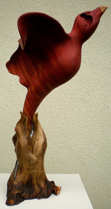 Phönix, Holzskulptur von Bildhauer Ralph Hübschmann