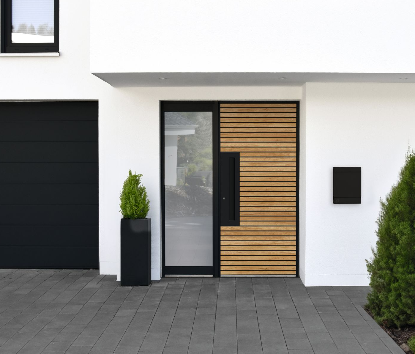 Klauke Alu-Haustür in schwarz mit Akustikpaneel Design, Seitenteil mit satiniertem Glas, eingebaut in weißer Hausfassade mit passenden Fenstern