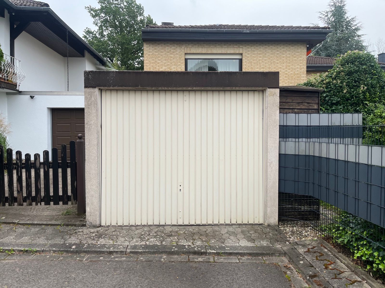 Schwingtor_Montage_Rolladen_Kessler Schwingtor_Montage_Saarland_Rolladen_Kessler