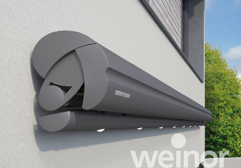 seitliche Ansicht der Halb-Kassettenmarkise Semina von WEINOR an der Wand montiert