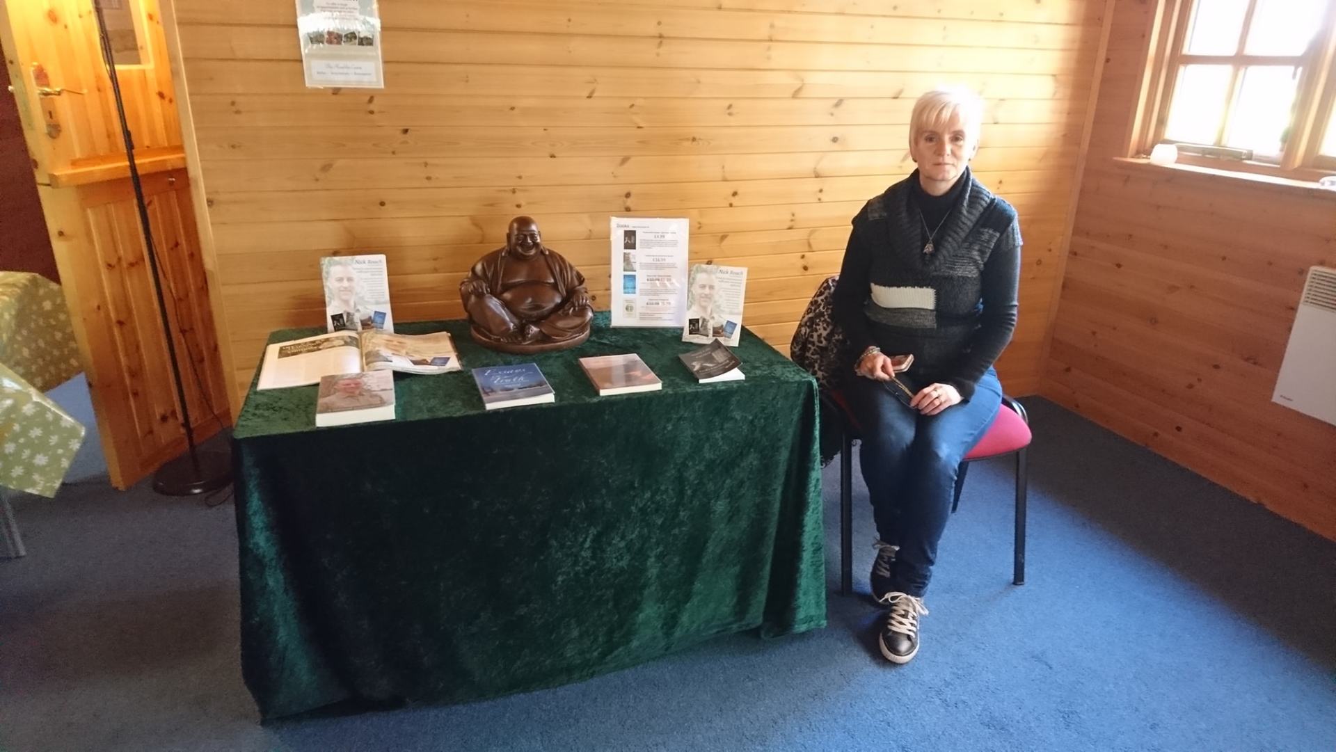 Sally sitting with books