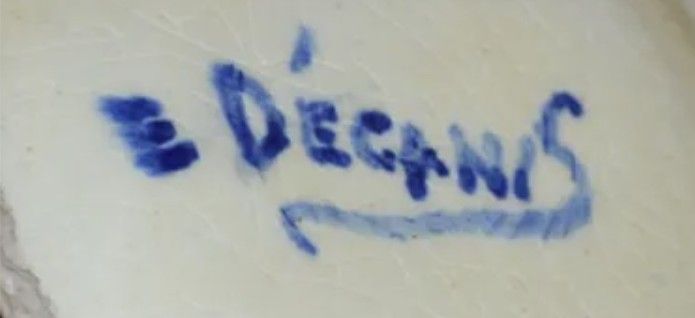 Signature E. Decanis