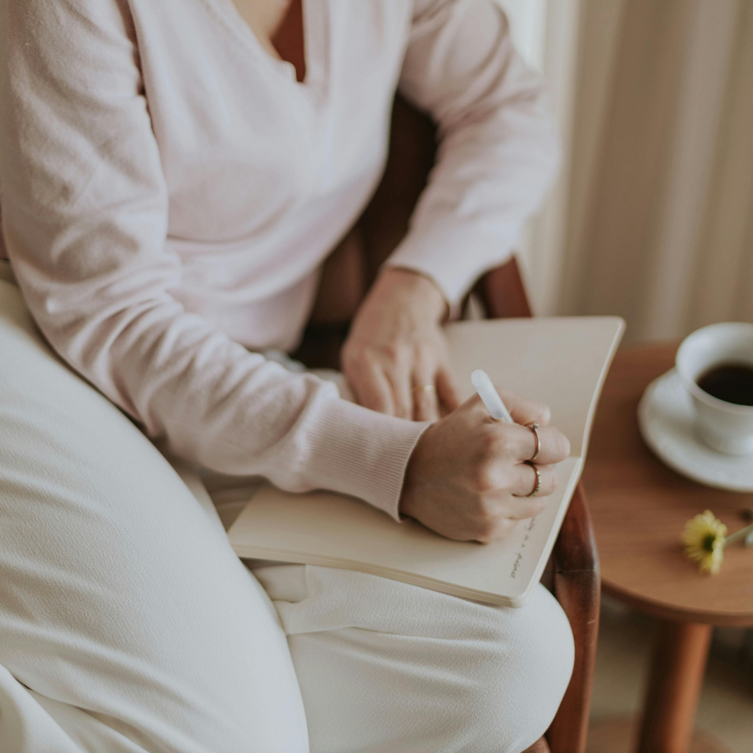 journaling. woman releasing her anxiety with writing.