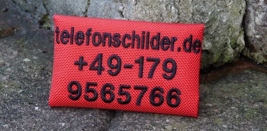 Telefonschild in der Farbkombination rot-schwarz, Gr.M Telefonschild