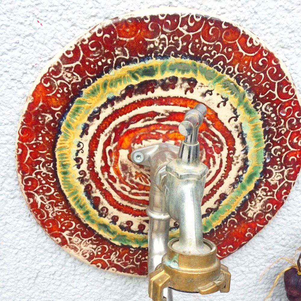 Keramik Dekoration am Wasserhahn