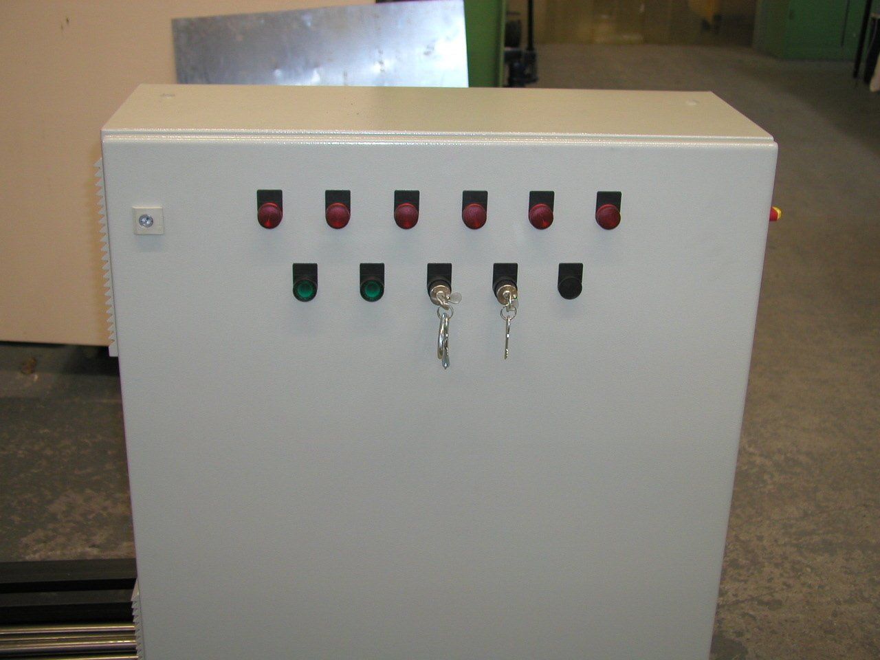 Amusement ride winch cabinet