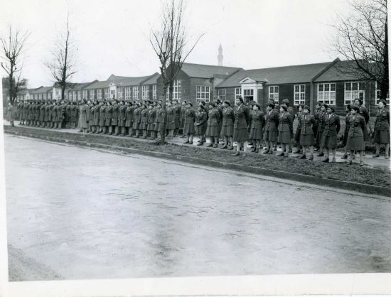 Women standing to attention