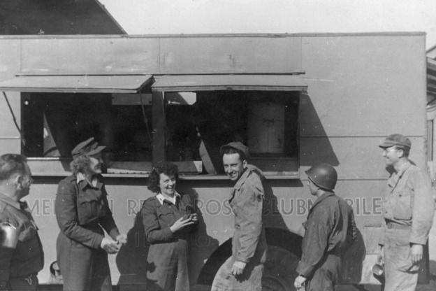 Elizabeth Richardson, second from left, in front of her Clubmobile