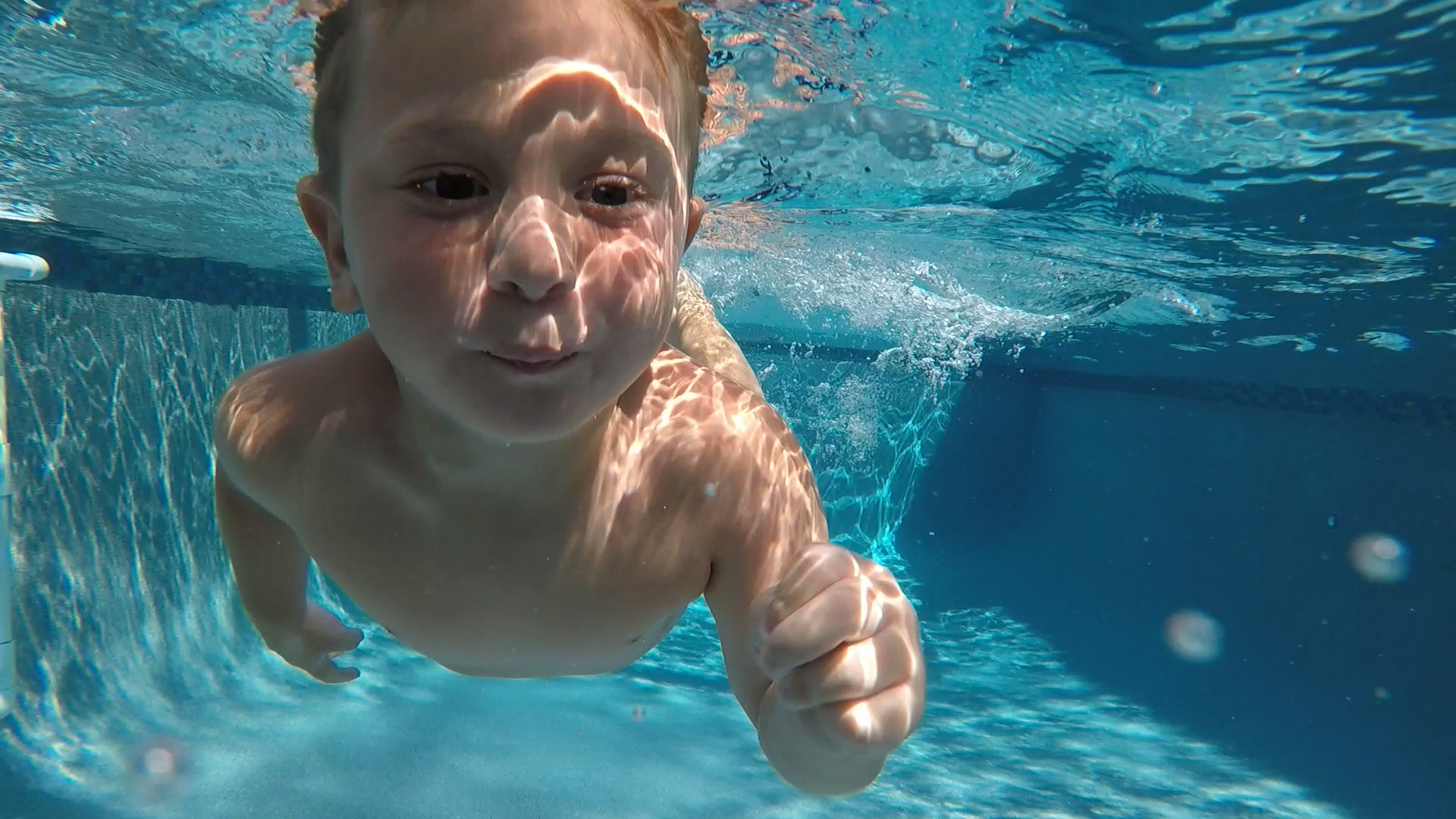 Children swimming in a pool