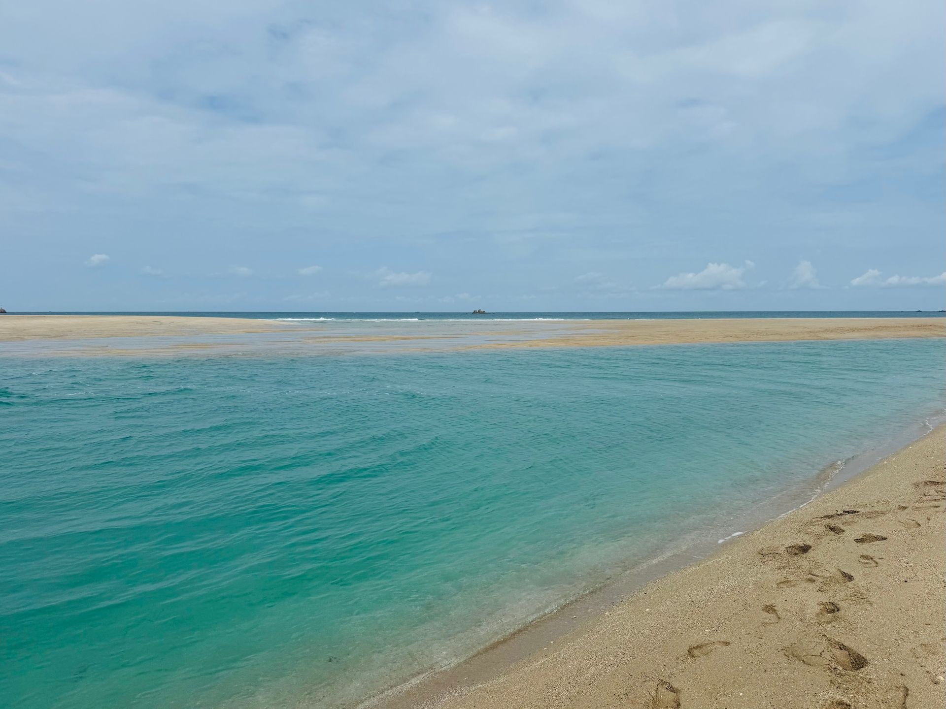 A sandbank at Les Minquiers blue sea and sand