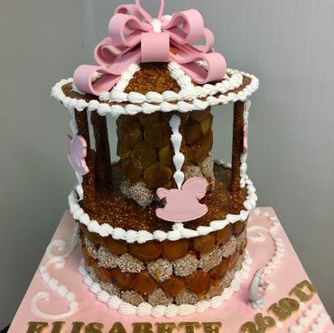 Pièce montée caroussel en choux Pièce montée caroussel en choux vanille rhum