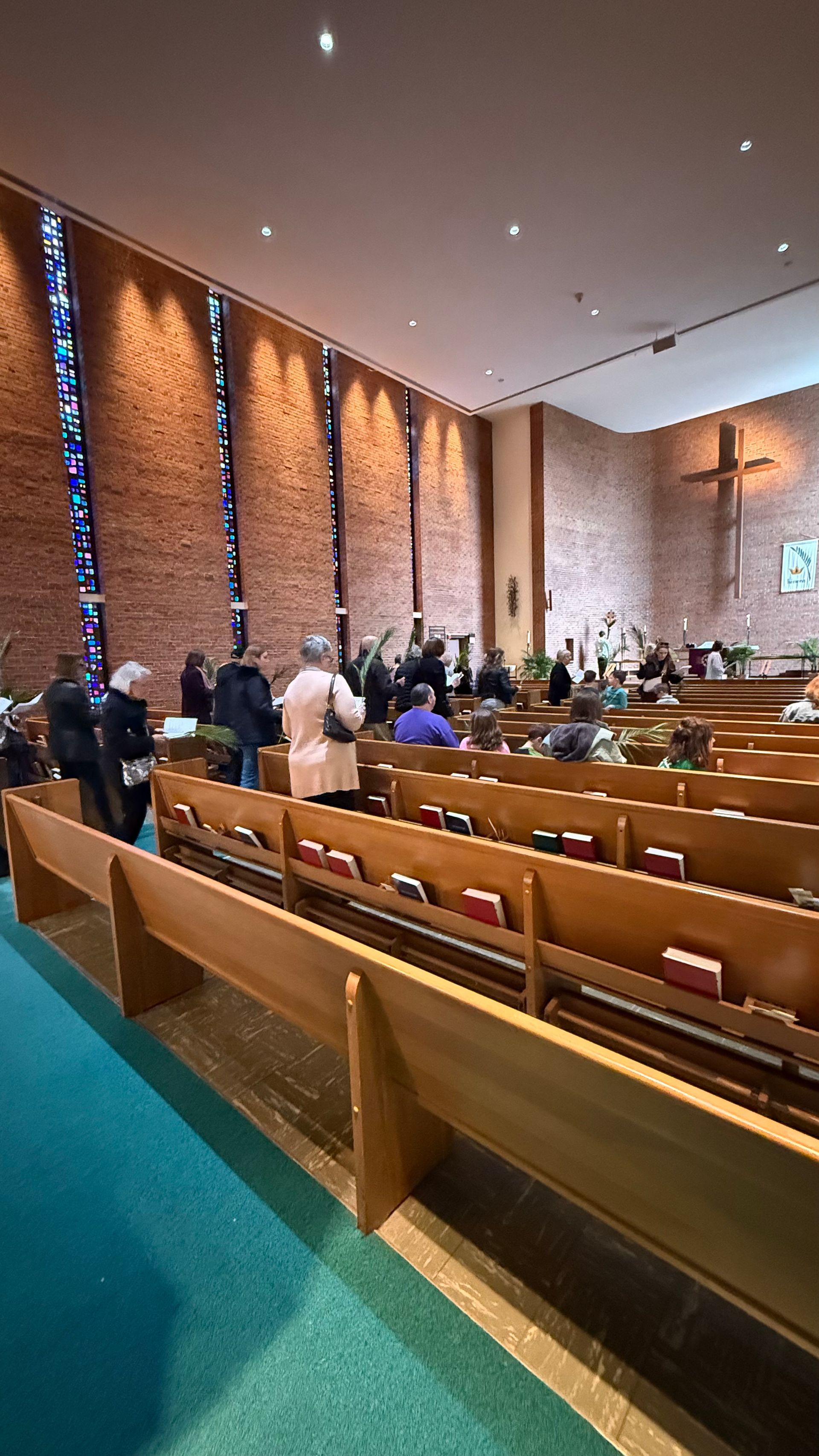 the sanctuary with people worshipping