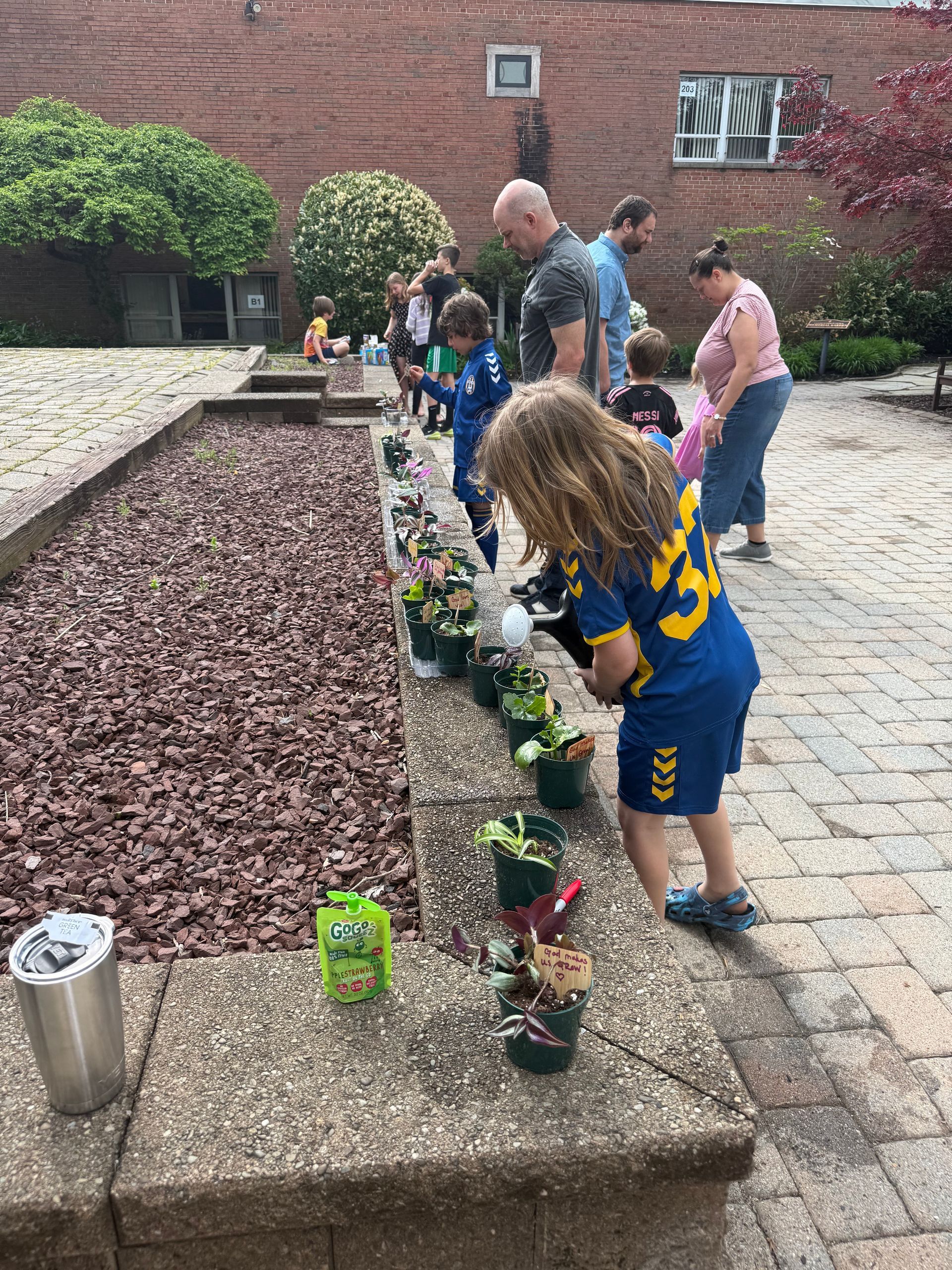 breakfast bunch kids planting seedlings for sharing
