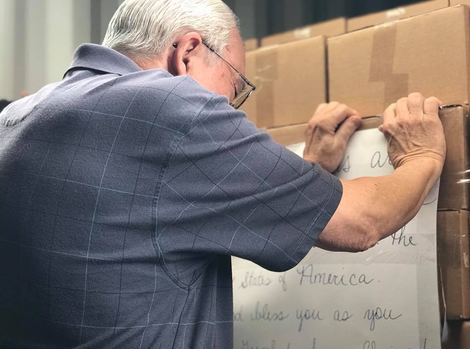 a worker loading boxes