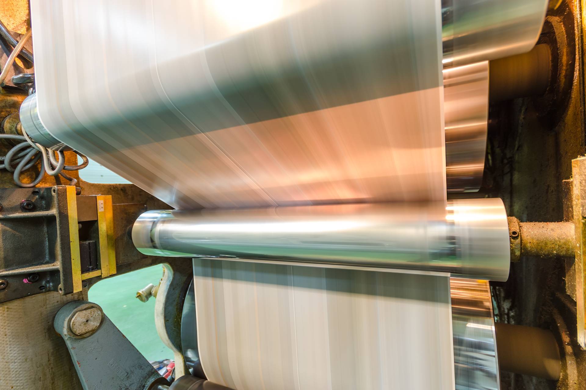 paper running through a printing press