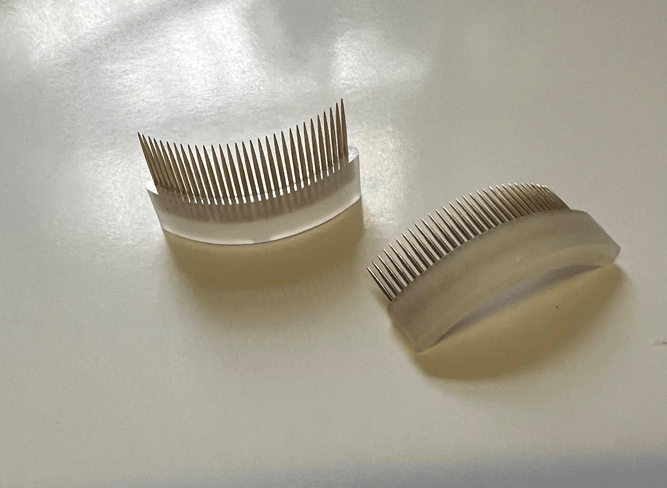 Curved eyelash comb