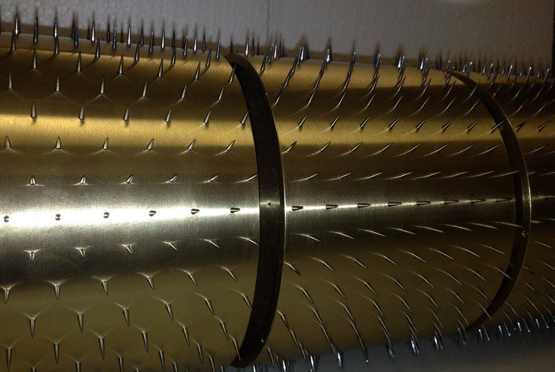 spiked roller segments interlocking