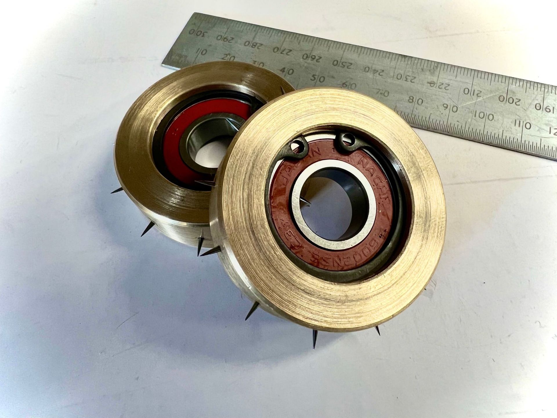 Perforator with bearings