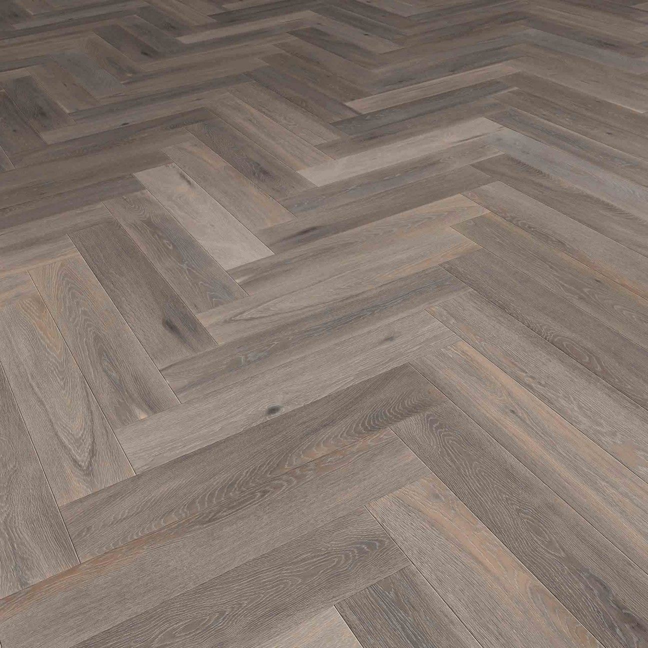 Diseño o patrón espiga o herringbone de los suelos de madera de parquet naturales