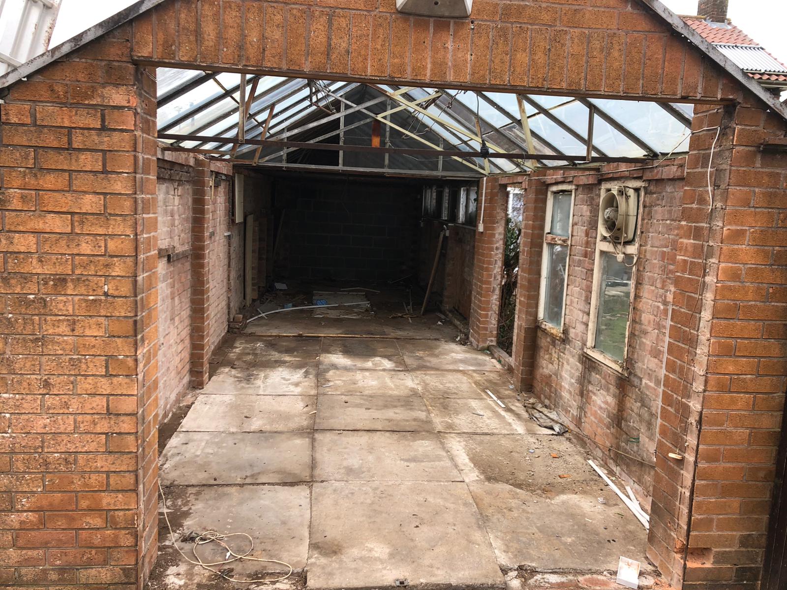 Brick garage demolition in Nottingham