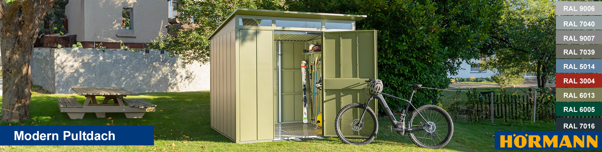 Hörmann Gerätehaus Modern mit Pultdach schiefergrün mt Fahrrad im Garten mit Parkbank und Gartenzaun Geräteschuppen Gartenhaus Schuppen Abstellhaus Laubenhaus Blechhaus Stahlhaus Fahrradgarage Quadgarage Mähergarage Pultdach Stauraum Stauraumsystem Berryhaus Berrygerätehaus Kaminholzregal Kaminholzlage pulverbeschichtet feuerverzinkt robust stabil langlebig Metal Metall Holzhaus Stahl Stahlblech schimmelresistent Pultdach Satteldach Modern Klassik Sicke Fundament Acrylglas Lichtreihe Tageslicht Grillhütte Unterstand Grillunterstand Holzunterstand
Hörmann Gerätehaus Geräteschuppen Gartenhaus Schuppen Abstellhaus Laubenhaus Blechhaus Stahlhaus Fahrradgarage Quadgarage Mähergarage Pultdach Stauraum Stauraumsystem Berryhaus Berrygerätehaus Kaminholzregal Kaminholzlage pulverbeschichtet feuerverzinkt robust stabil langlebig Metal Metall Holzhaus Stahl Stahlblech schimmelresistent Pultdach Satteldach Modern Klassik Sicke Fundament Acrylglas Lichtreihe Tageslicht Grillhütte Unterstand Grillunterstand Holzunterstand