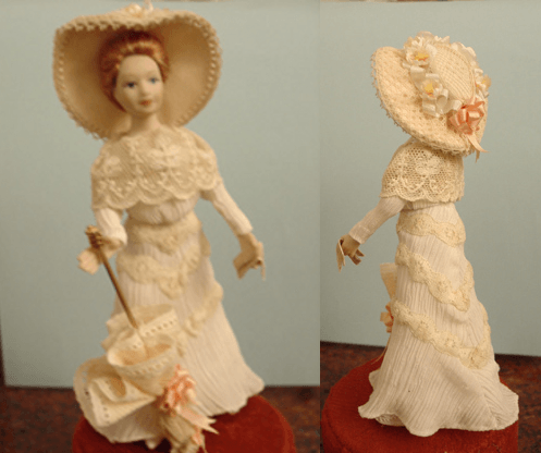 Adele, one inch scale porcleain doll in Edwardian costume.