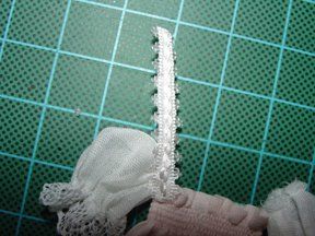 Glue trimming along raw edge of sleeve