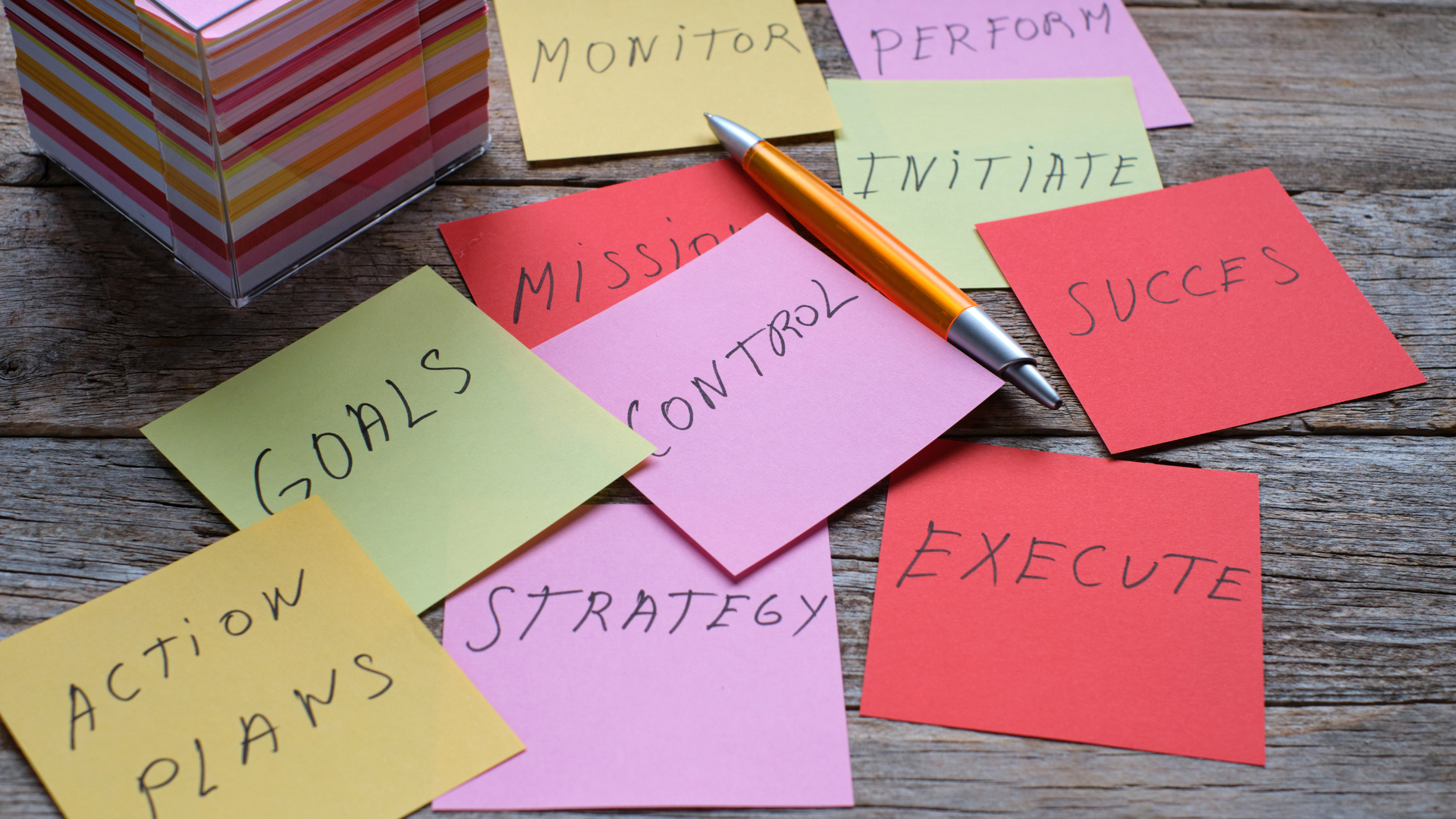 Image of post it notes with key planning words on