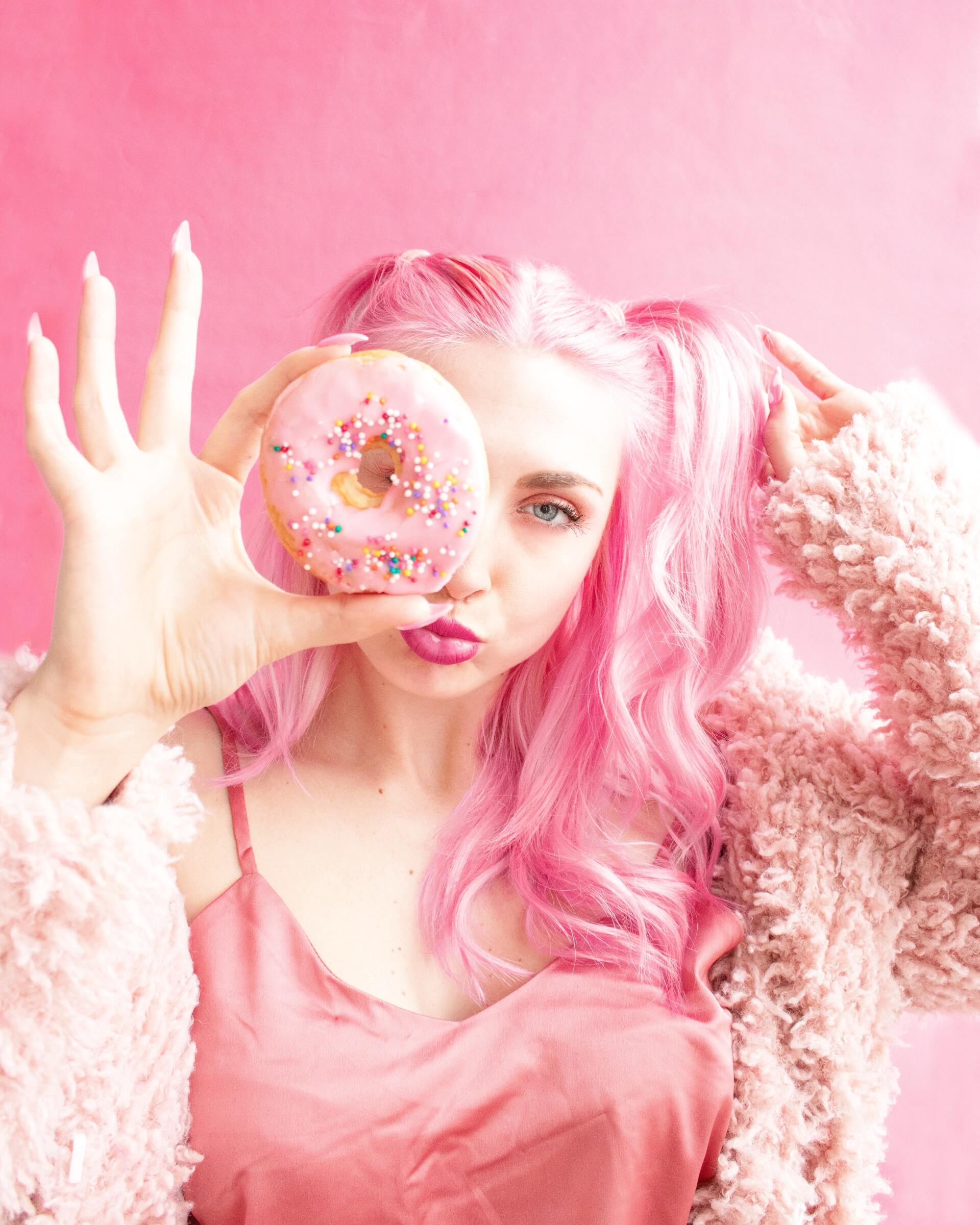 Woman with pink hair and kawaii style