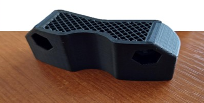 Pièce imprimée en 3D par dépôt de filament vue en coupe