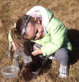Child With her New German Shorthaired Pointer