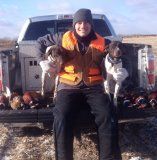 Owner, his Pointers, and their Fowl Hunting Catch of the Day