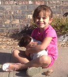 Little Girl with her New Puppy