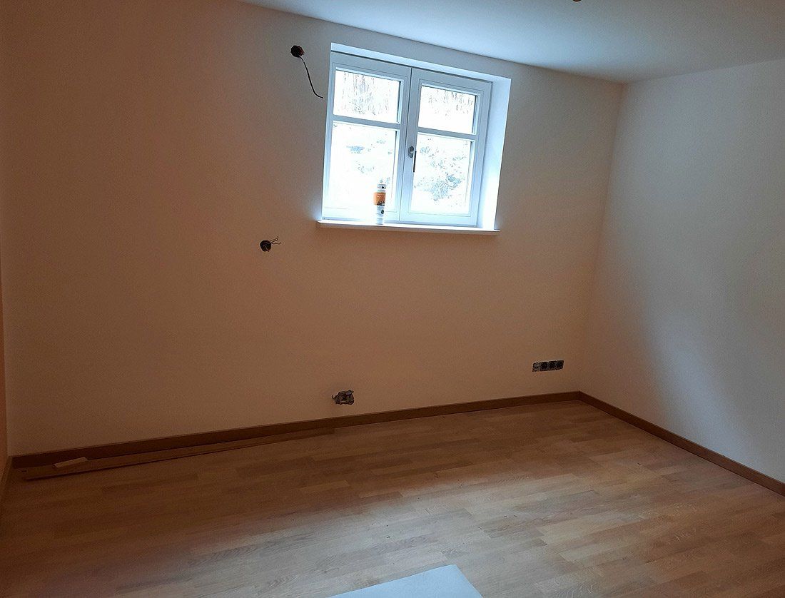 sanierte Souterrainwohnung mit Innendämmung und Mineralputz, QFS Bauleistung