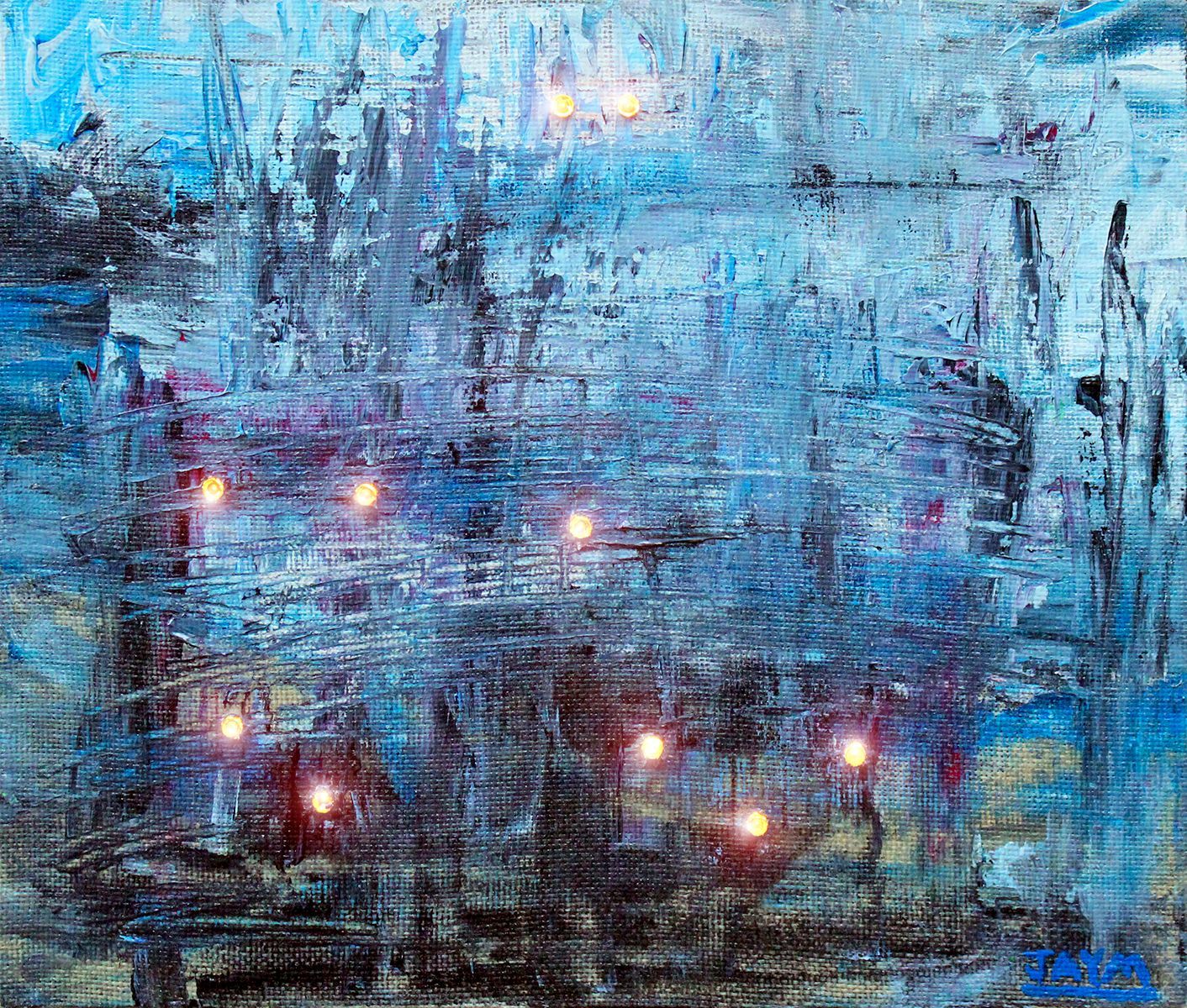 Halos de lumières sur une tableau d'art.