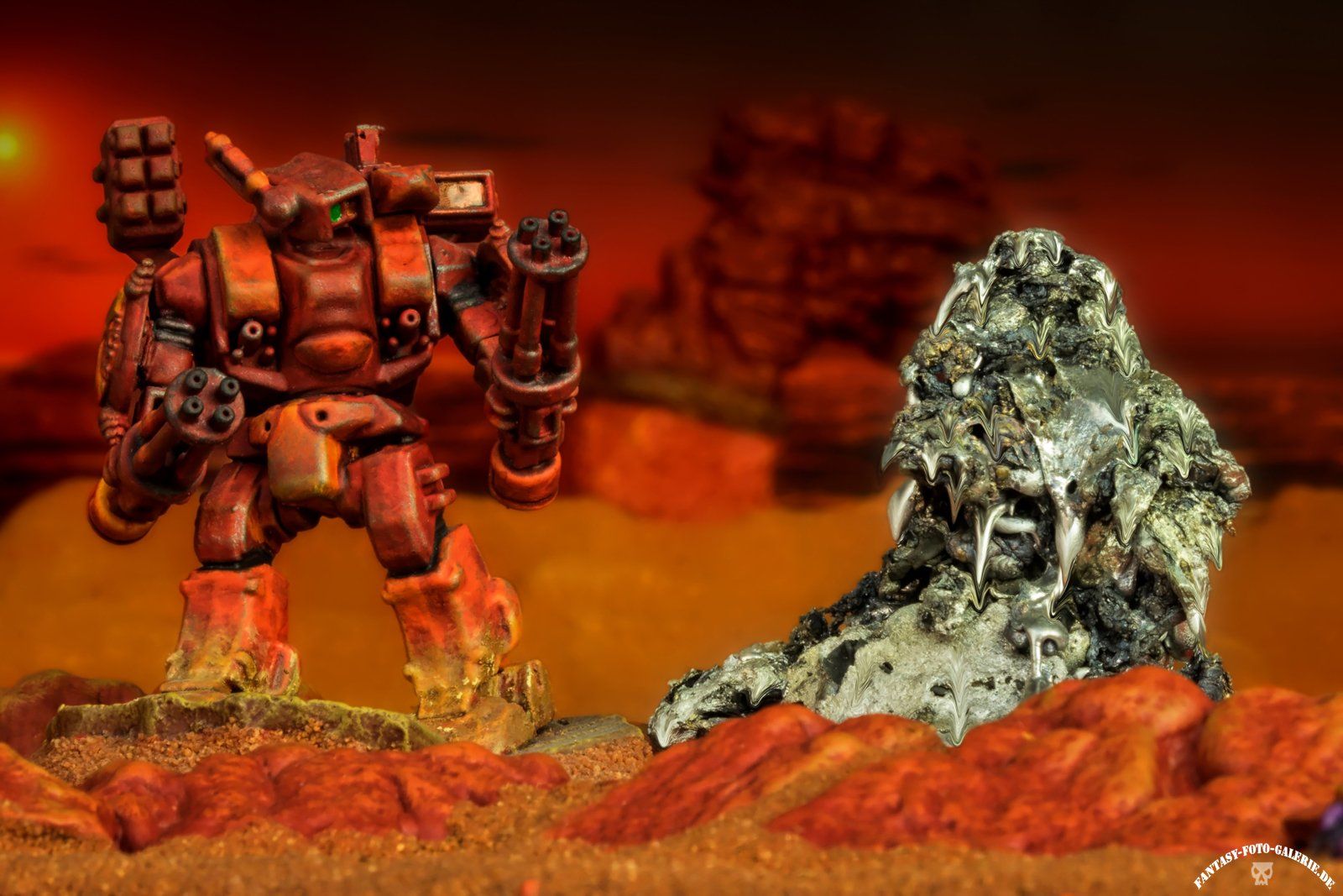 One T´pau combat robot look at the melted leftover of the alien enemy.