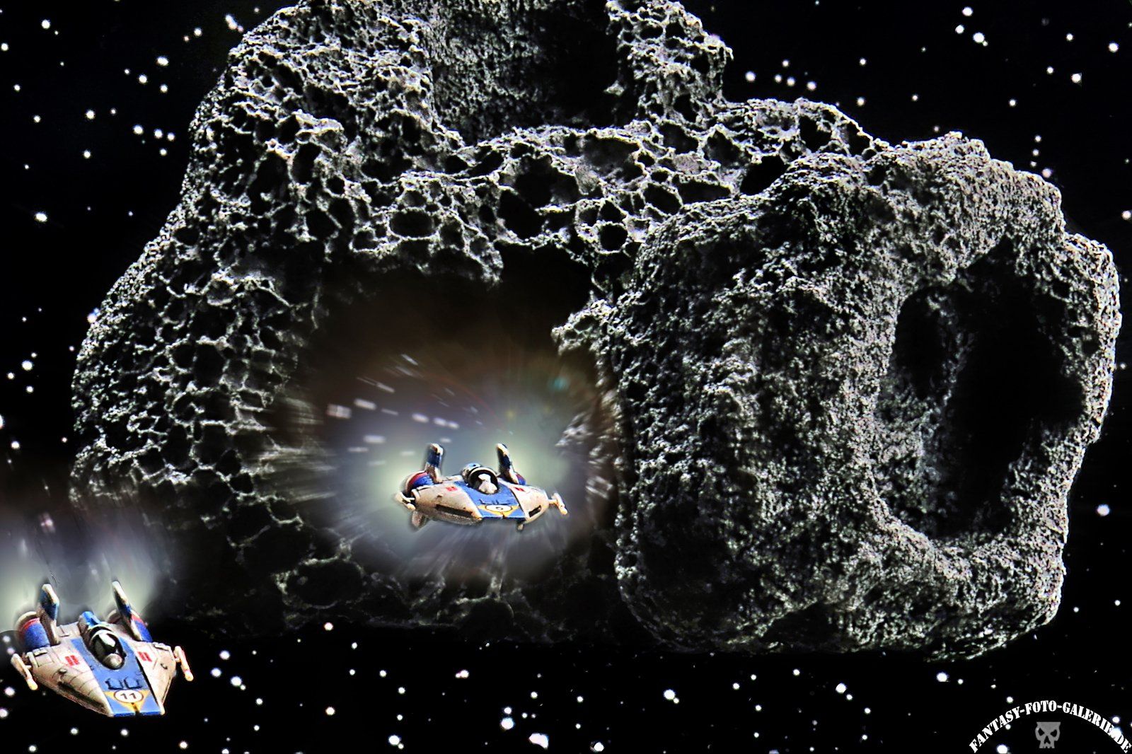 Fantasy Foto Raumschiffe vor Asteroiden