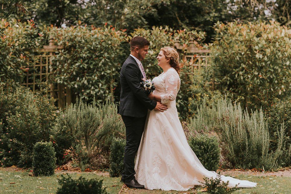 Outdoor wedding ceremony, garden wedding ceremony in Warwickshire. Dog friendly wedding. Horse friendly wedding.