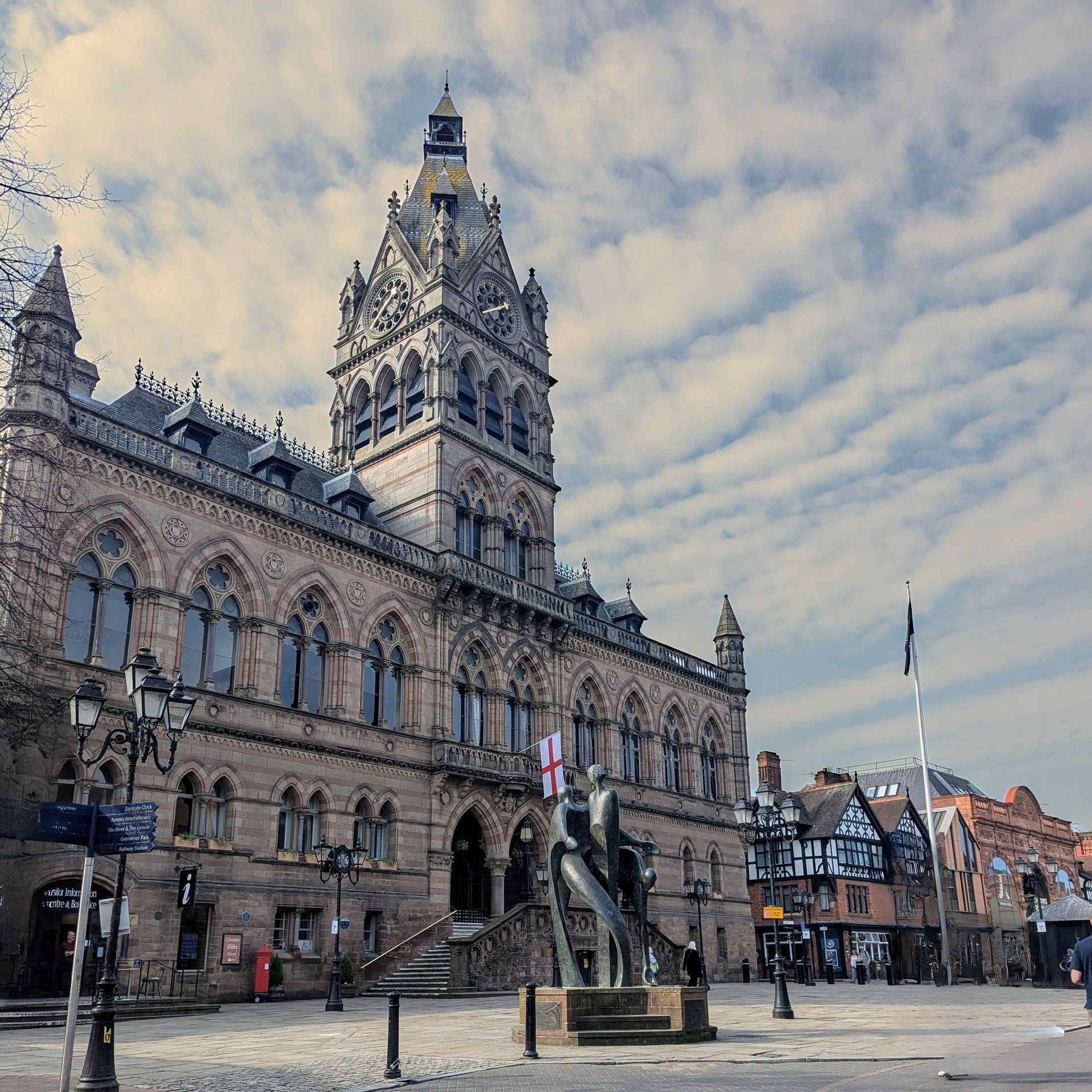 family having a picnic outside in the sunshine