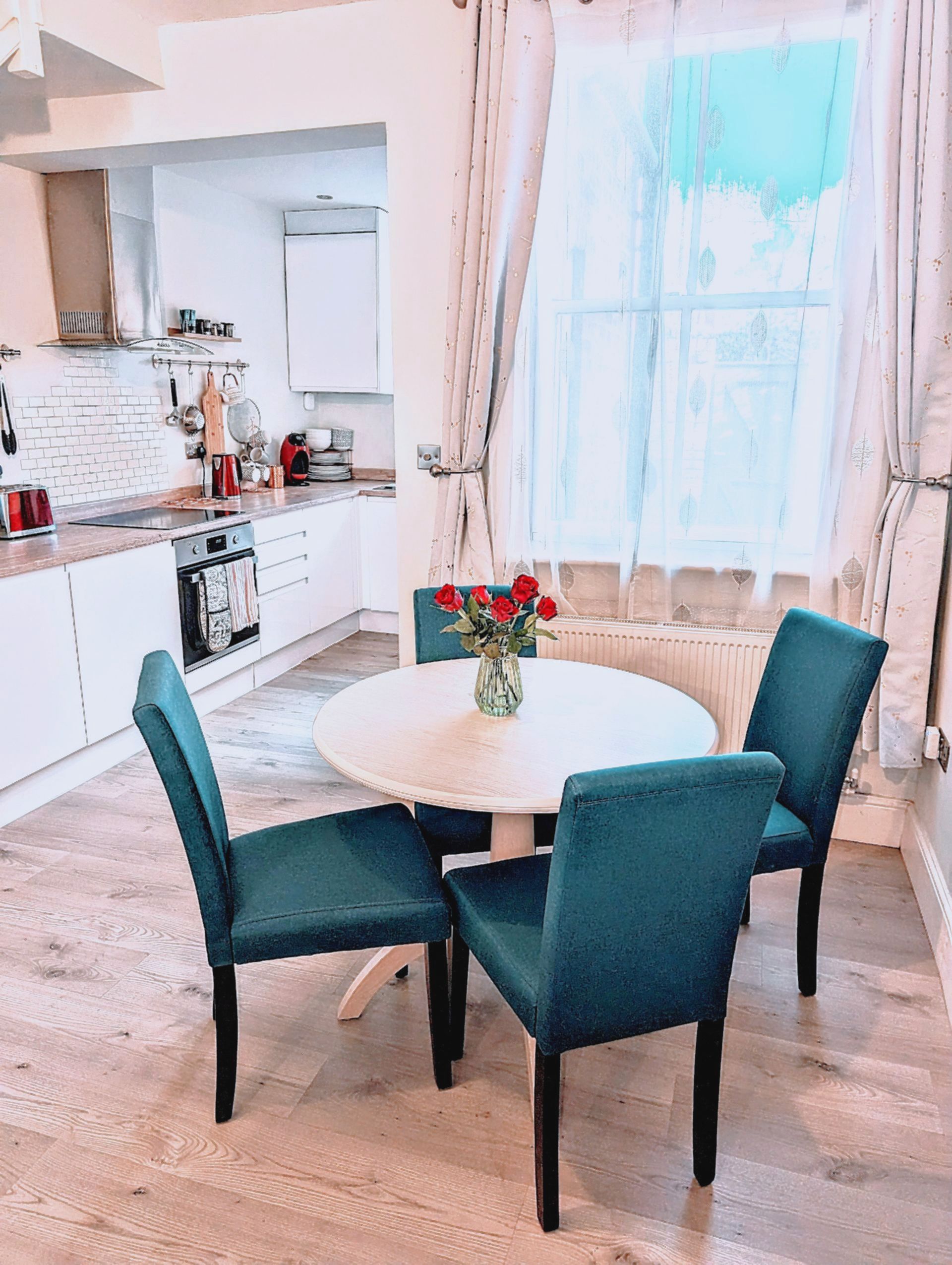 dining and kitchen area showing open plan space