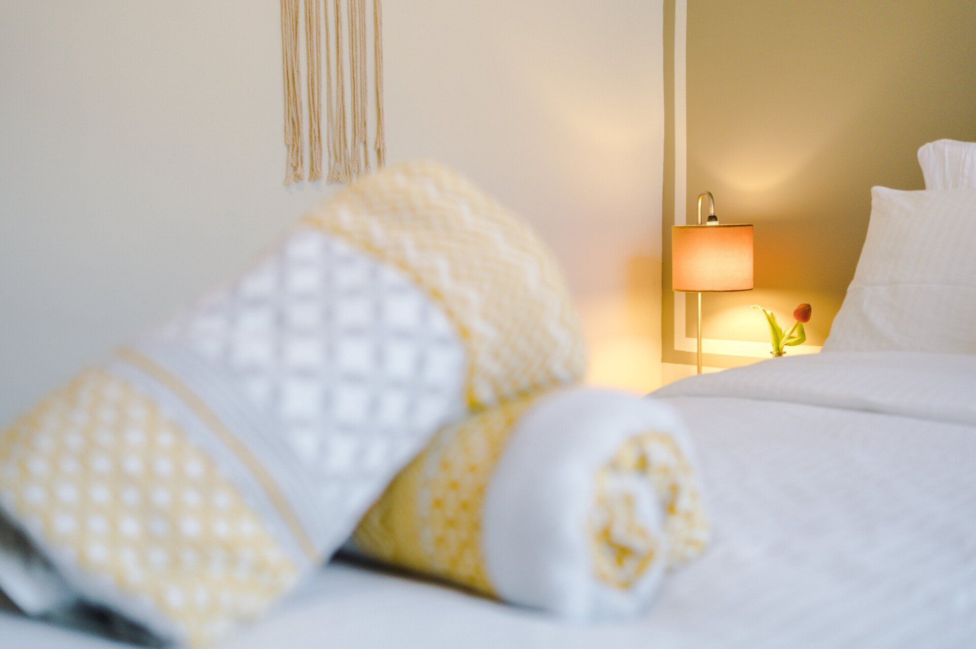 rolled up fresh yellow towels