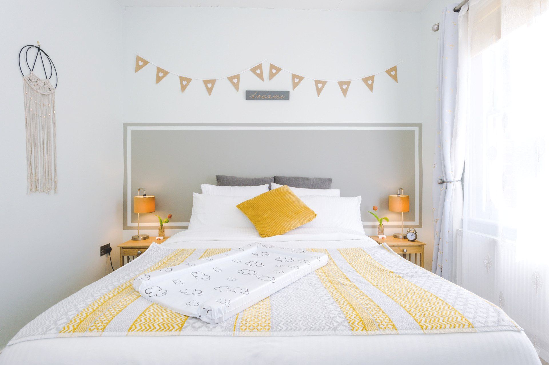 main king bed with baby changing map