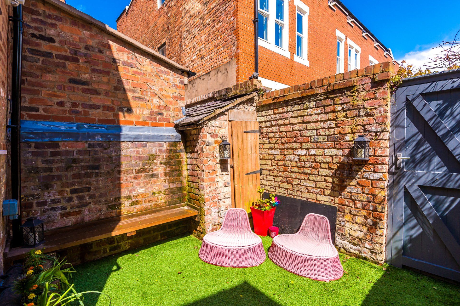 walled back garden showing sunny low seating