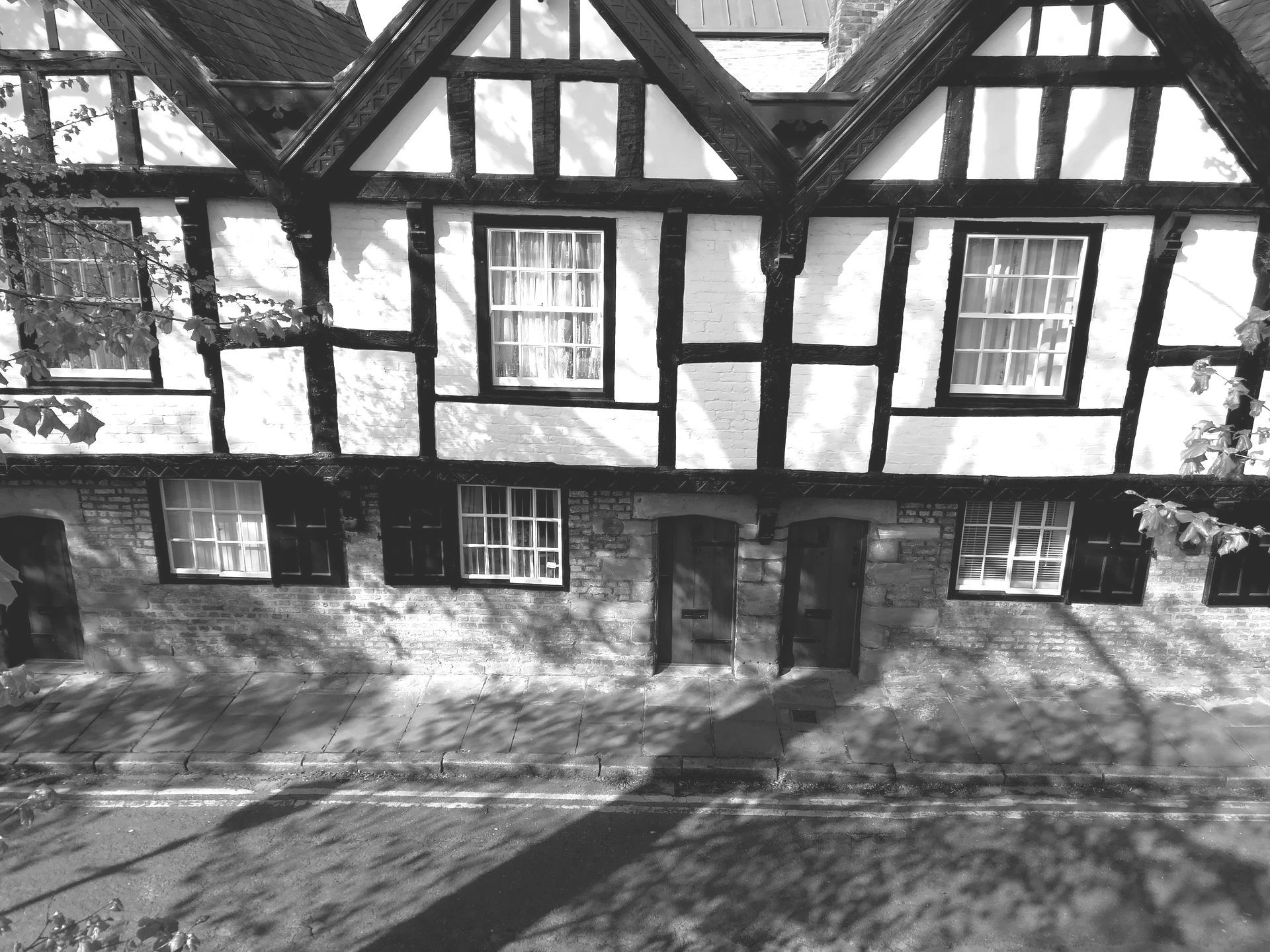 up on the chester walls looking at the black and while tudor buildings