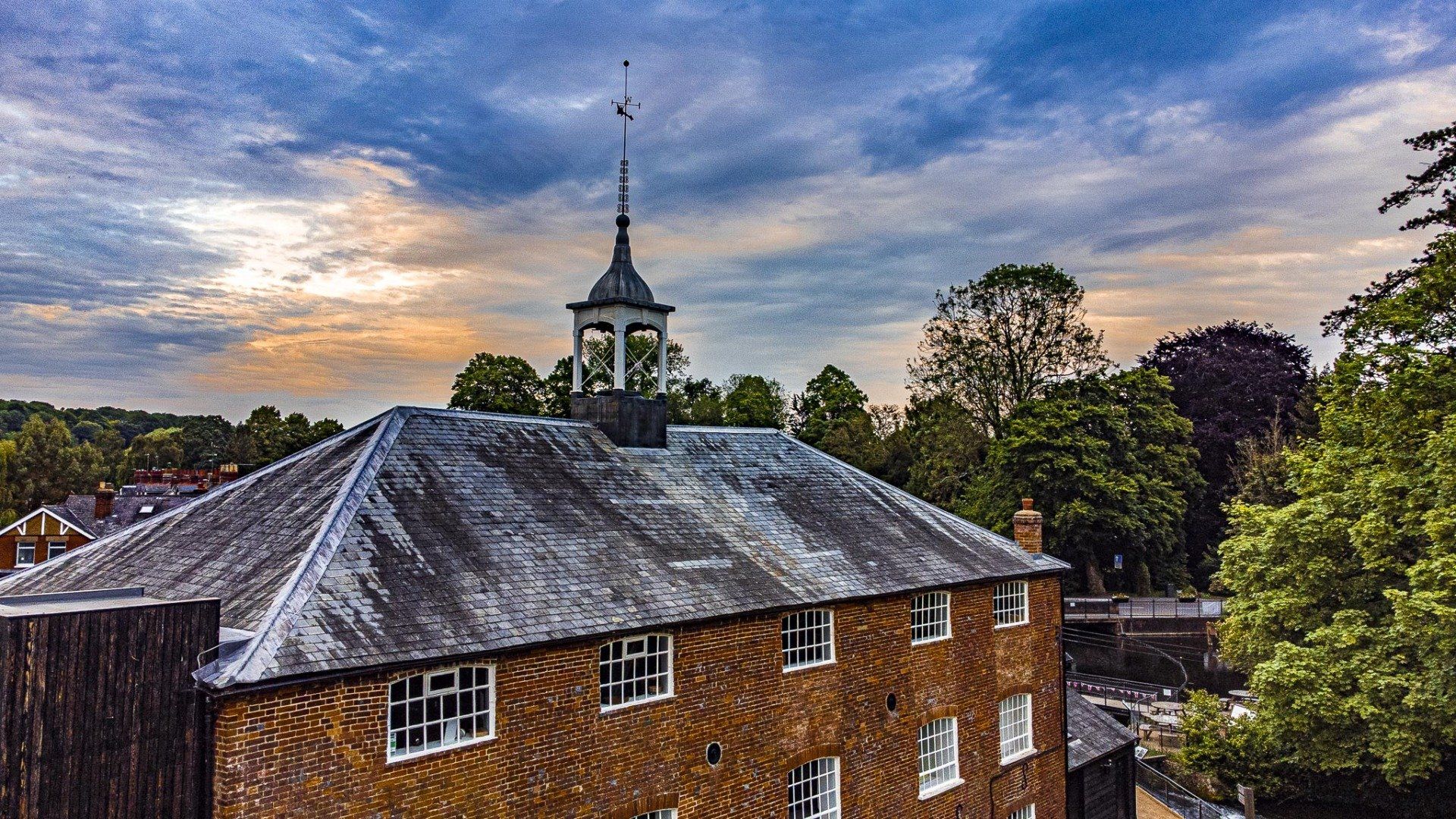 Whitchurch Silk Mill with moody skies