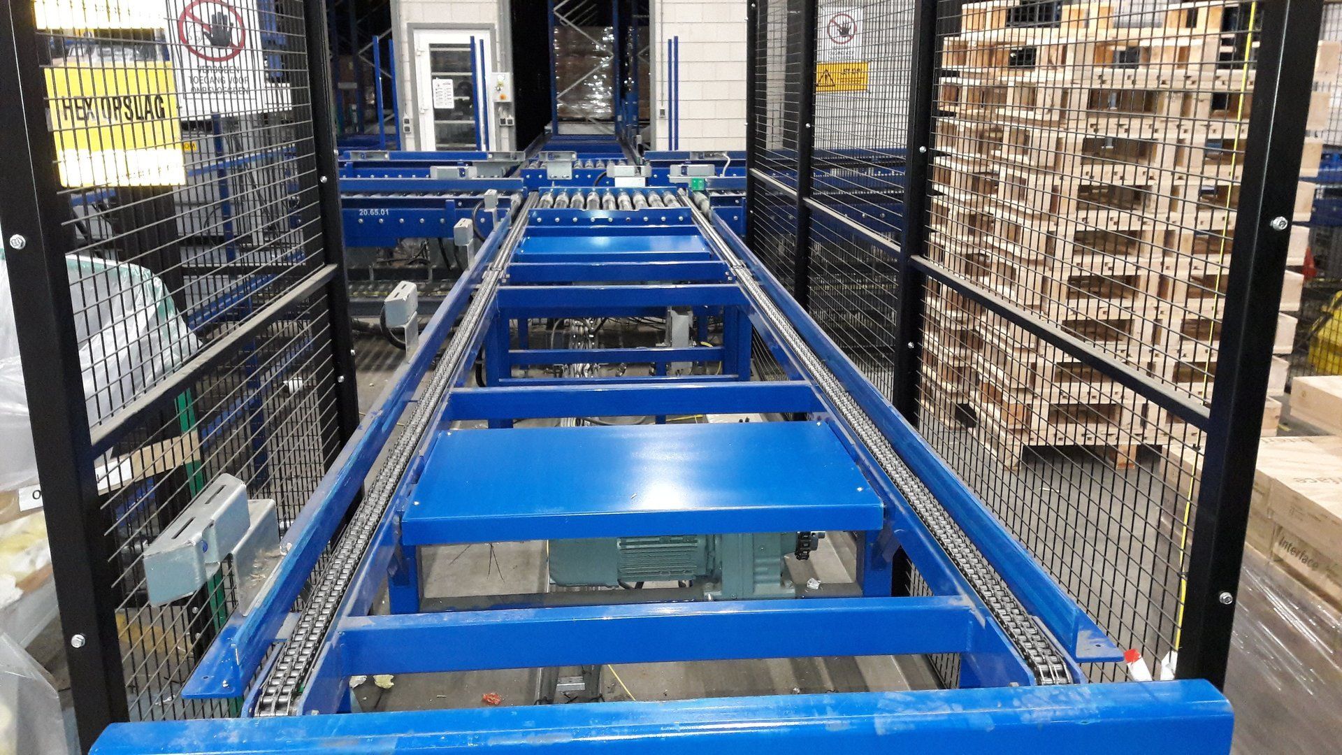 Kettenförderer mit Winkelübergabe