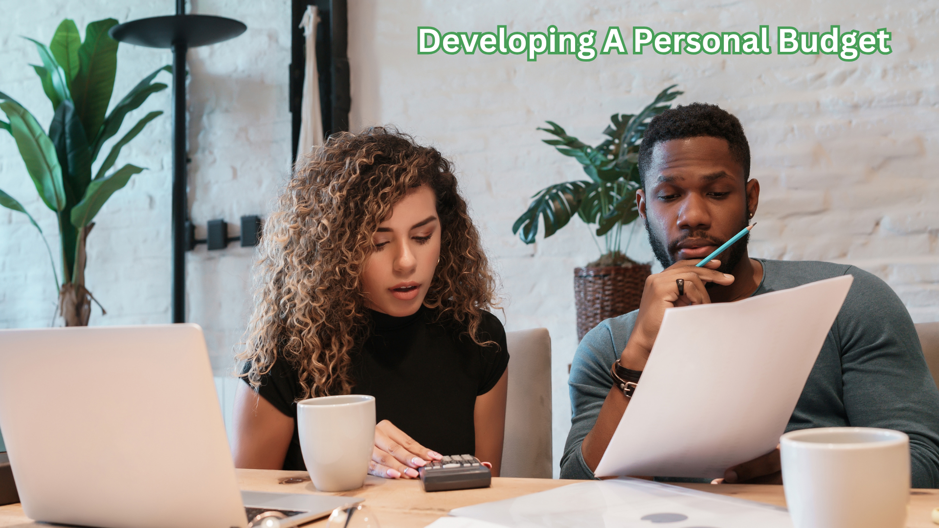A couple developing a personal buget.
