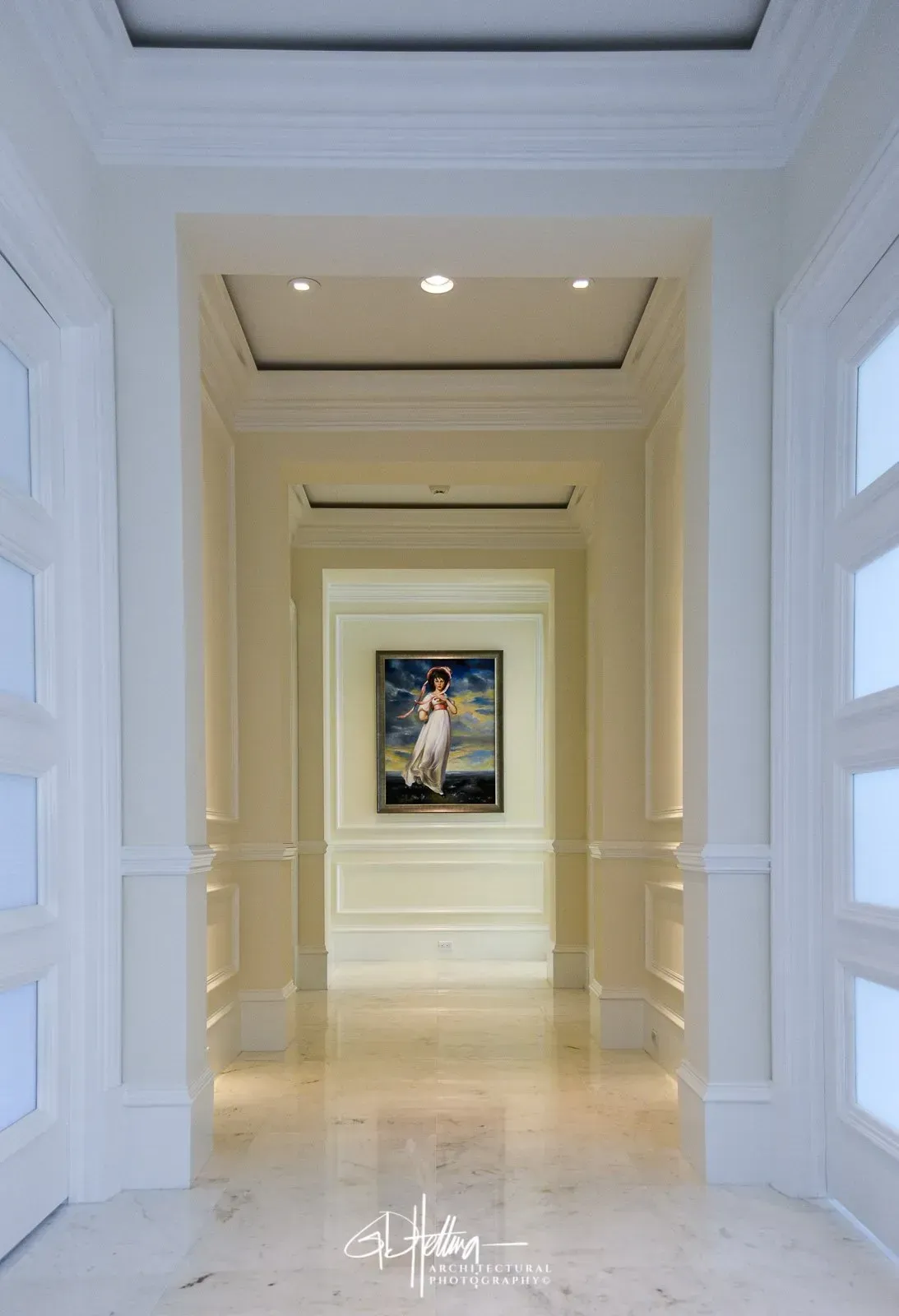 Minimalist white hallway interior with clean architectural lines in Naples, FL