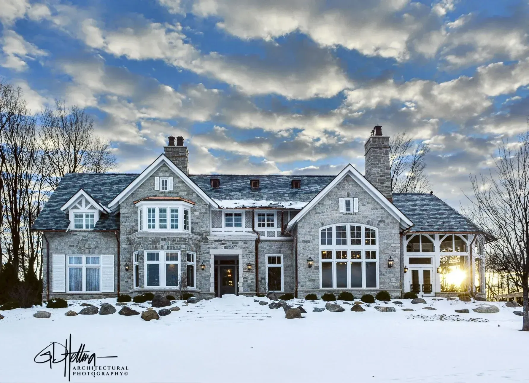 Snowy exterior residential view featuring modern architecture and seasonal landscape design – Pier-700B