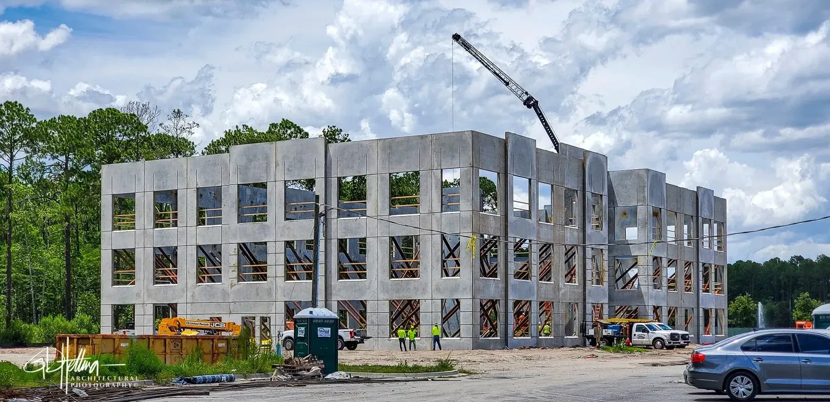 Tilt-up concrete wall construction process showing heavy industrial building method and panel installation Nocatee FL